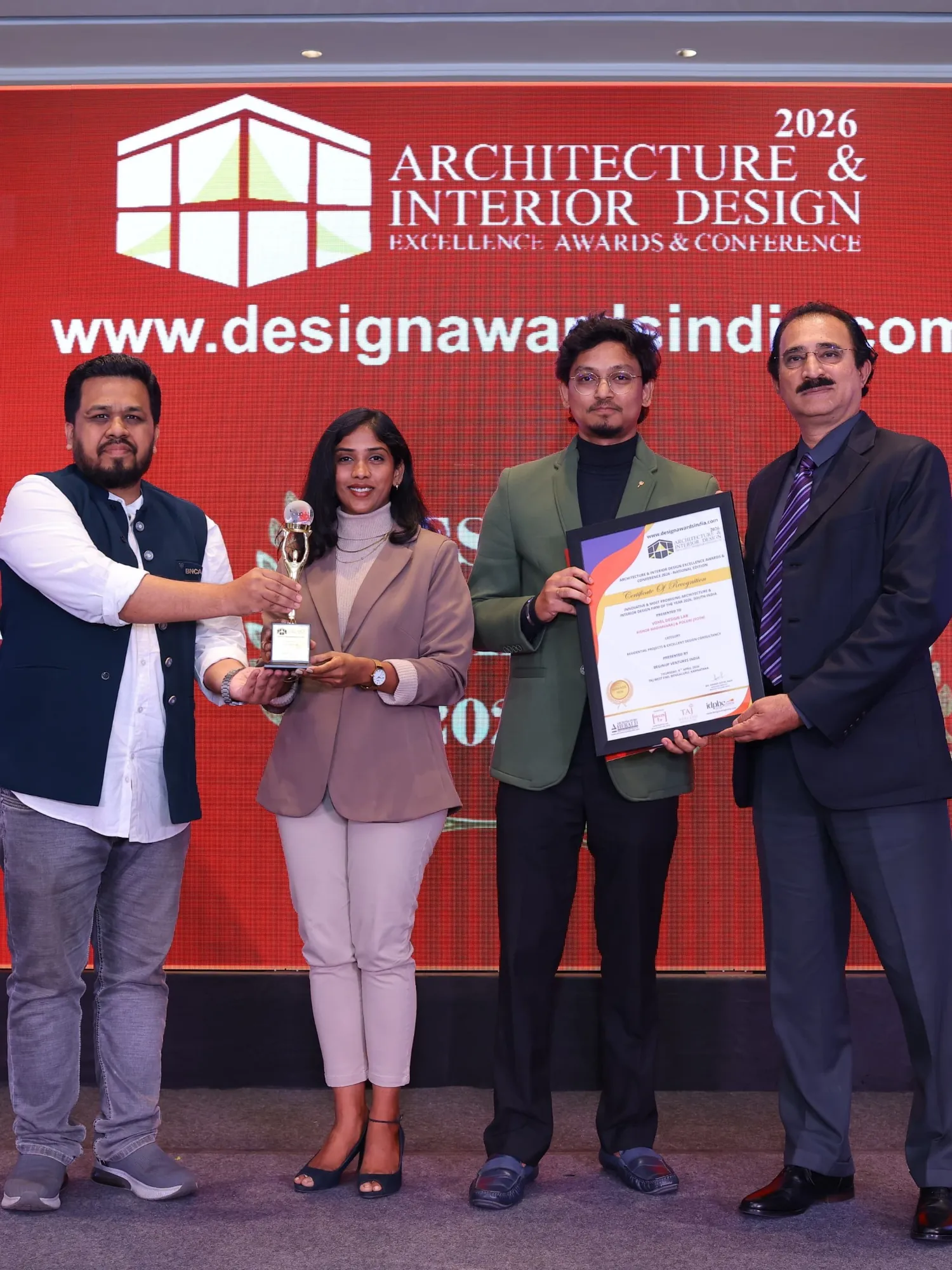 Voxel Design Lab receiving the 2026 Architecture & Interior Design Excellence Award